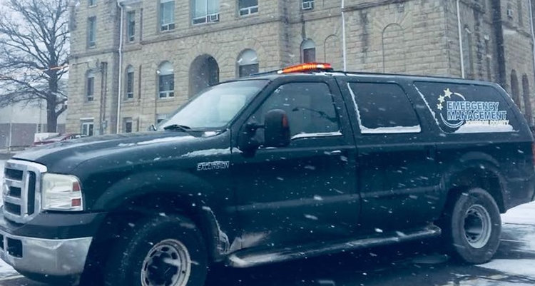 A large black emergency vehicle.