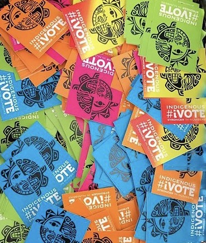 Bright, colorful postcards that read "vote." Helping to improve voter access for indigenous communities.